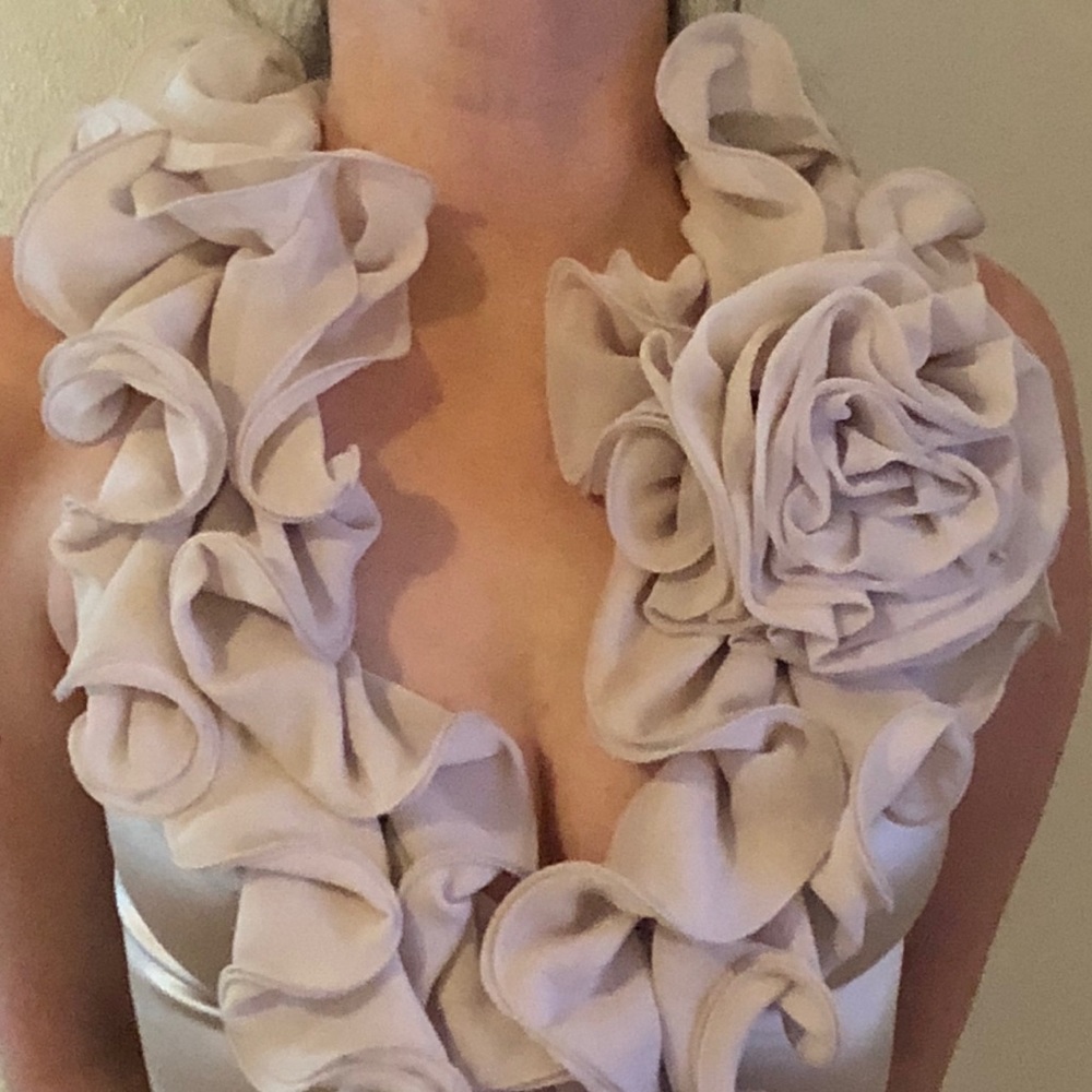 Beautiful new Bebe ruffled top